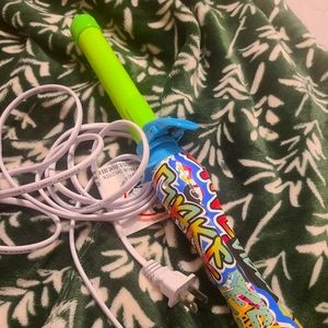 Rotating Beach waver curling iron.